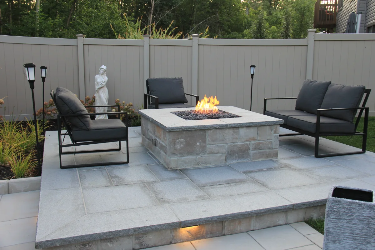 Astrolabe raised fire lounge beside the pool terrace