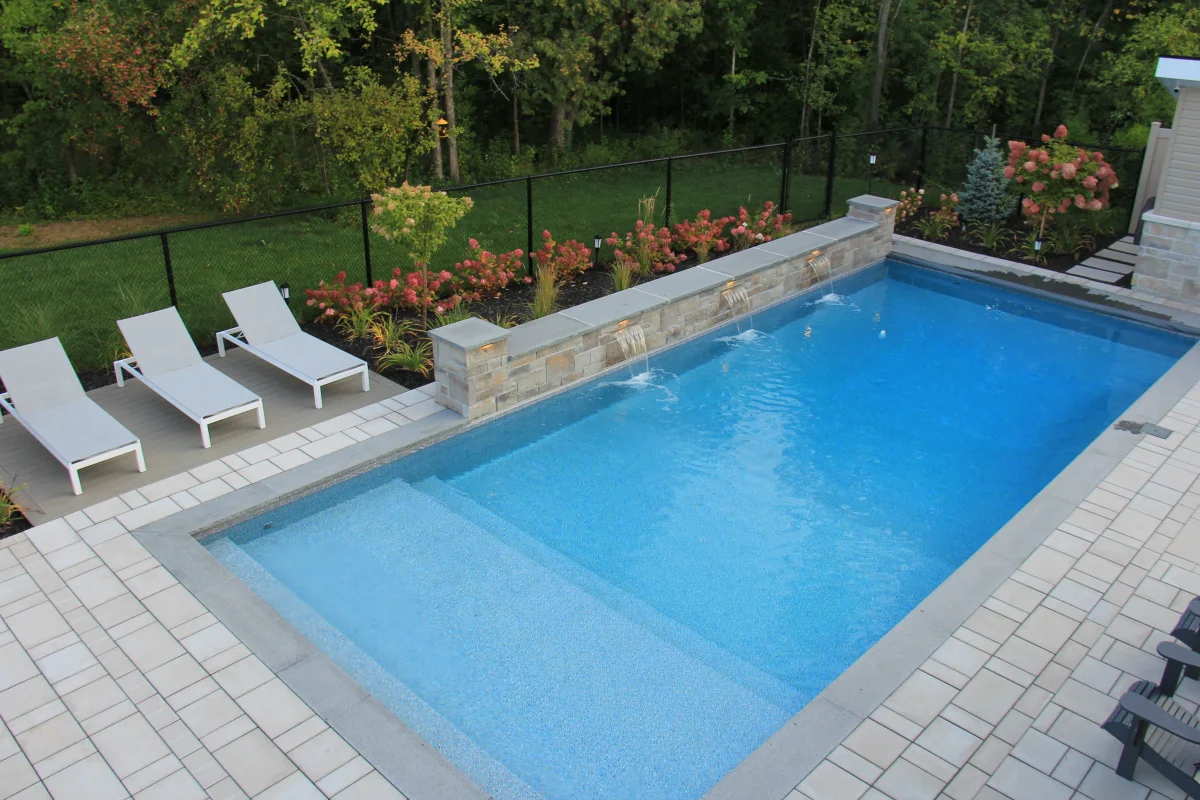 Elevated view of the pool, water wall and lounge terrace — Astrolabe archive photograph IMG_6932