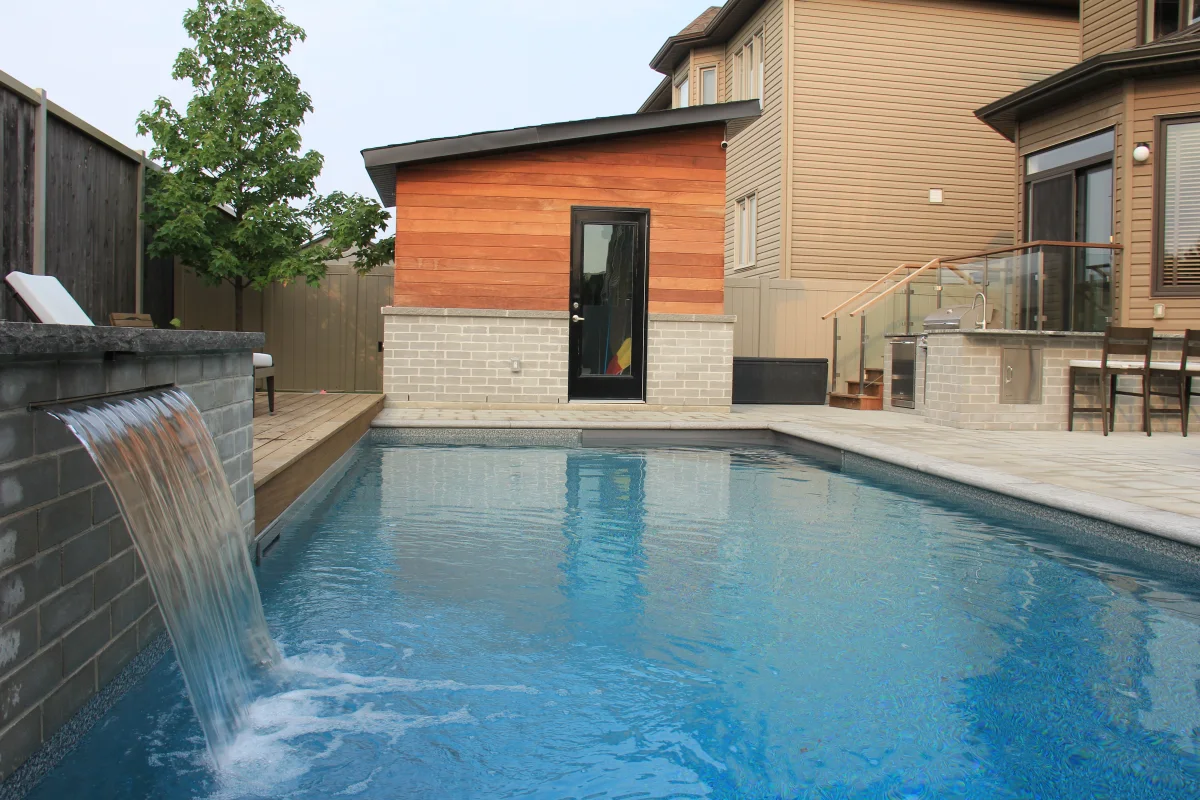 Mickelberry pool waterfall and cedar-clad cabana