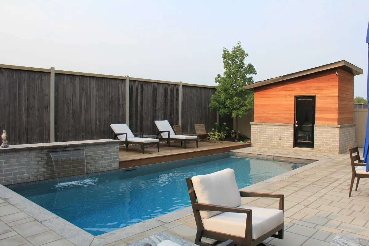 Pool, cedar cabana and dining terrace across the compact backyard — Mickelberry archive photograph IMG_6856