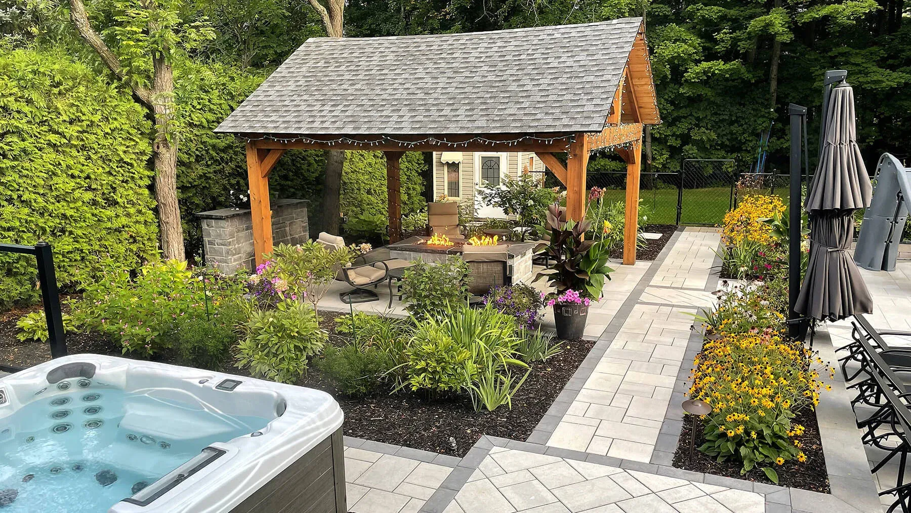 Rivercrest Escape pool, cabana and wooded backyard