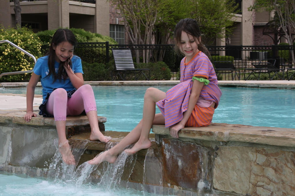 Backyard pools are a great opportunity to include stunning water features.