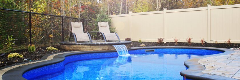 Beautiful pool with water features and interlocking stones