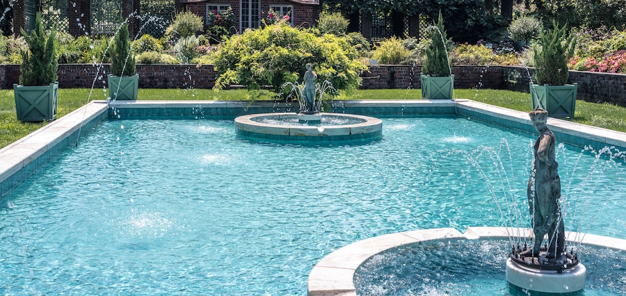 Pool with fountain water features