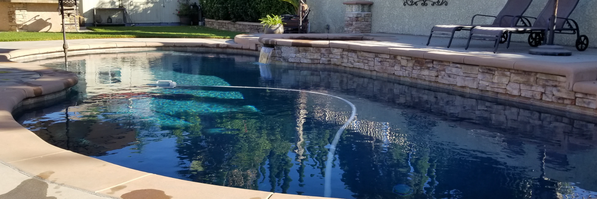 new backyard pool with spa