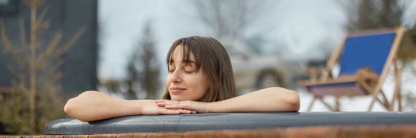 A woman relaxing in a hot tub